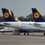 Man Arrested On Flight After Threatening To Open Plane Door