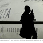 Delta apologizes for flight attendants’ brawl that forced flight diversion APphoto_Cellphones Planes Travelers