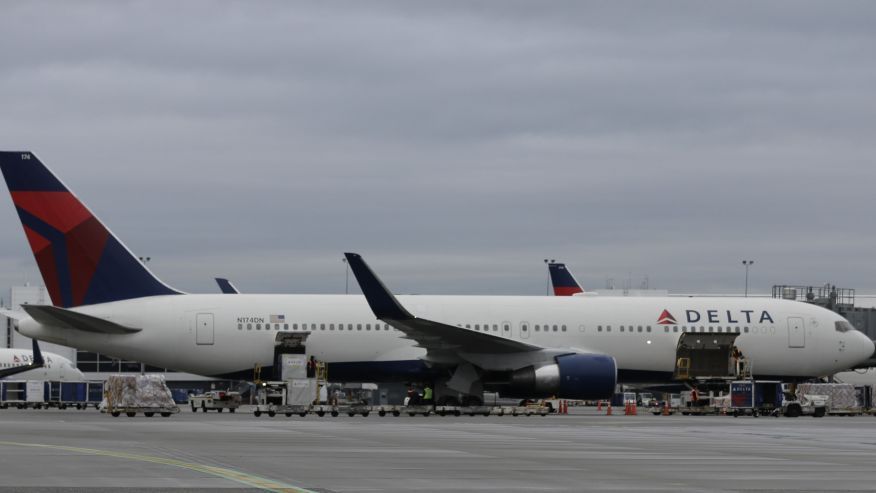 A four-hour Delta flight between the Dominican Republic and New York ended up taking 30 long, puke-filled hours. (AP Photo/Ted S. Warren) 