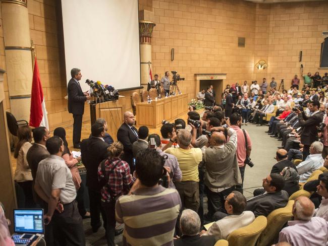 Egypt's Aviation Minister Sherif Fathy speaks during a press conference at the Ministry of Civil Aviation at Cairo's airport. He said he could not rule out either terrorism or a technical problem.