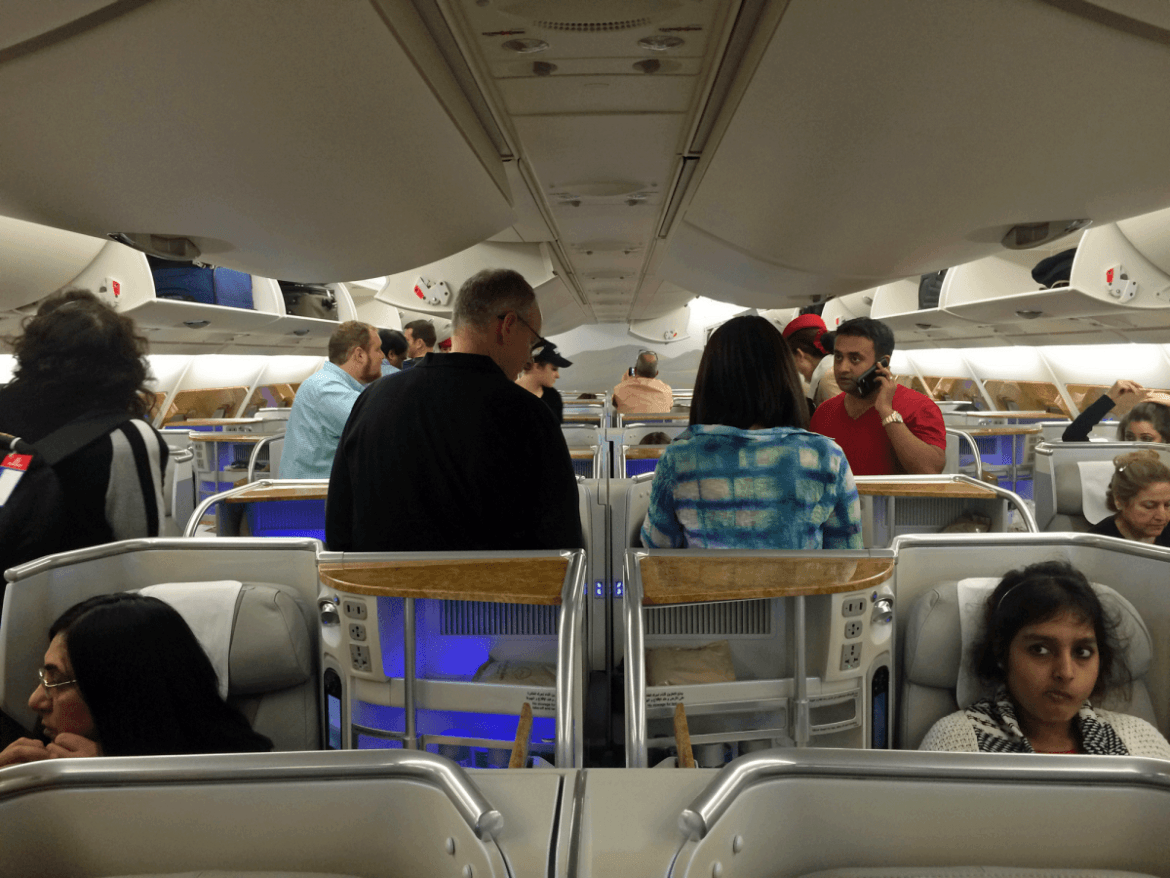 Emirates' A380 was shiny and new, with lacquered surfaces and funky mood lighting. The seats were four across, with two in the center aisle and one by each window.