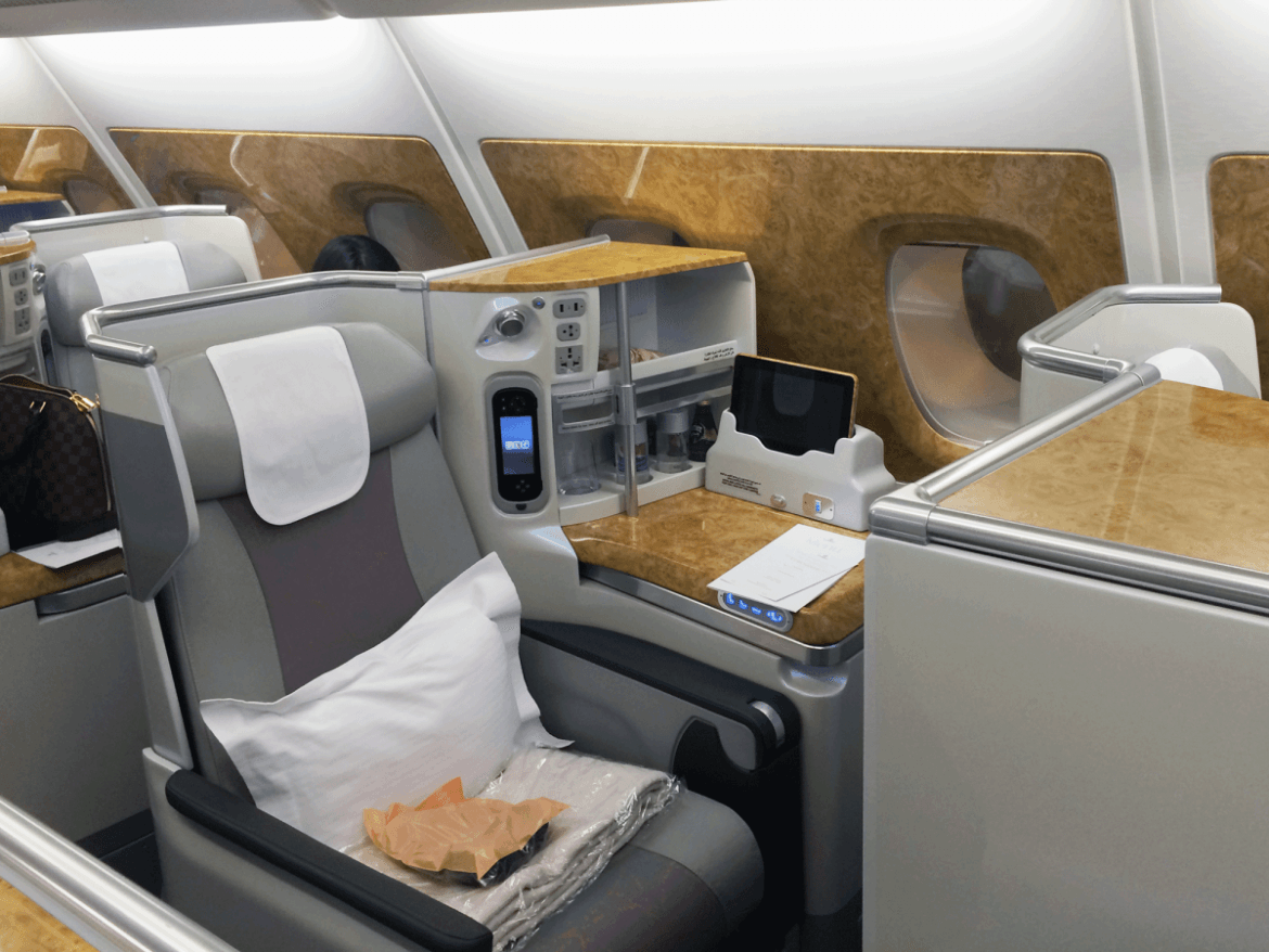 How cool is the Emirates setup, though? The 18.5-inch seat turned into a lie-flat bed, and there was a big space beside it to store stuff. The seat had electrical outlets and two remote control options: a handheld remote AND an iPad.