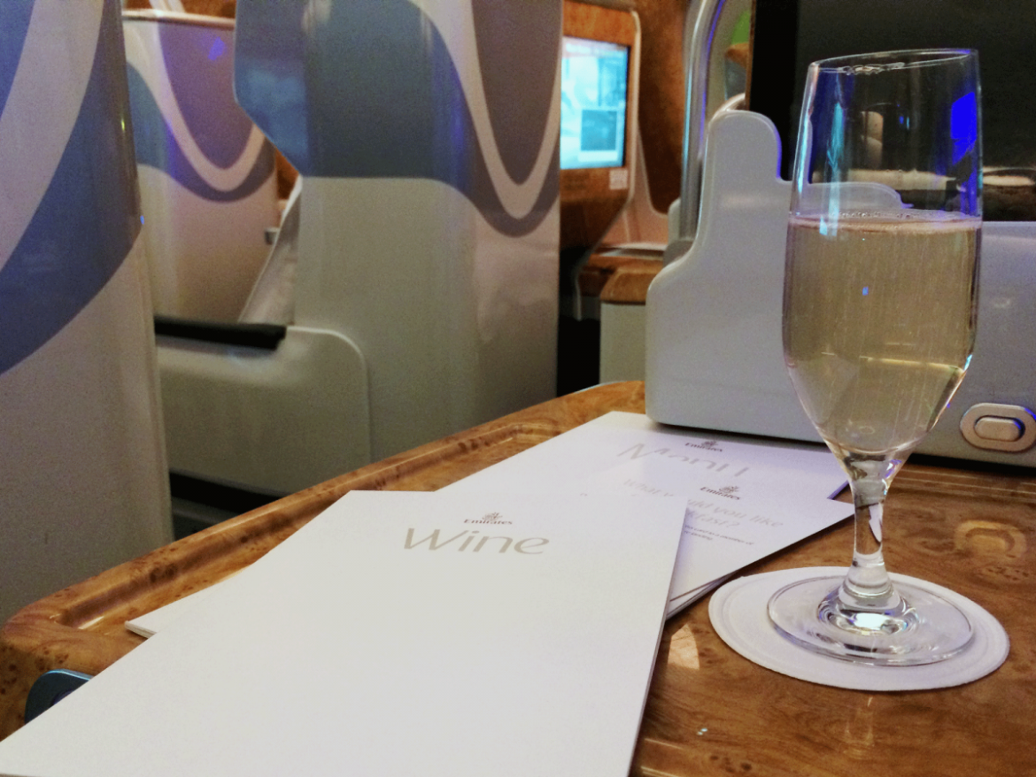 Cheers! Flight attendants came around with champagne before the Emirates flight left JFK.