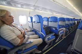 The average distance between rows of economy class seats has dropped from 35 inches before airline deregulation in the 1970s to about 31 inches today. (iStock)